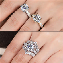 Load image into Gallery viewer, 3.5 Ct.TW Round Brilliant with 0.8 Ct.TW Side Stones Diamond Ring